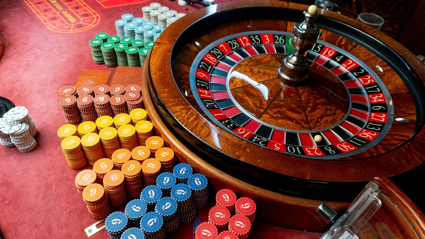 Why are many people playing slot games today?